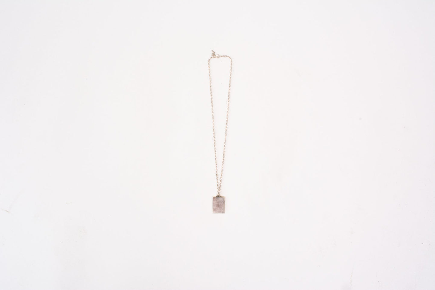 Necklace with a pendant on a white background